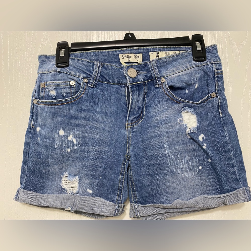 Distressed denim shorts